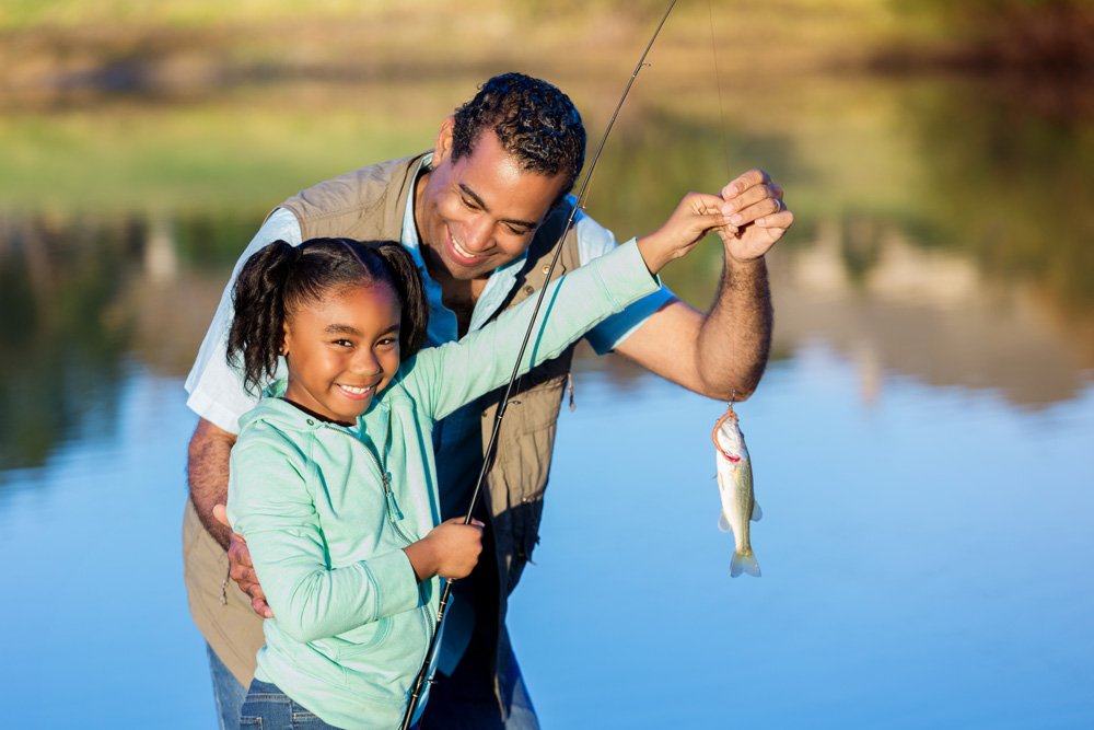 Father & Faughter Fishing At Big Al's Fishing Hole
